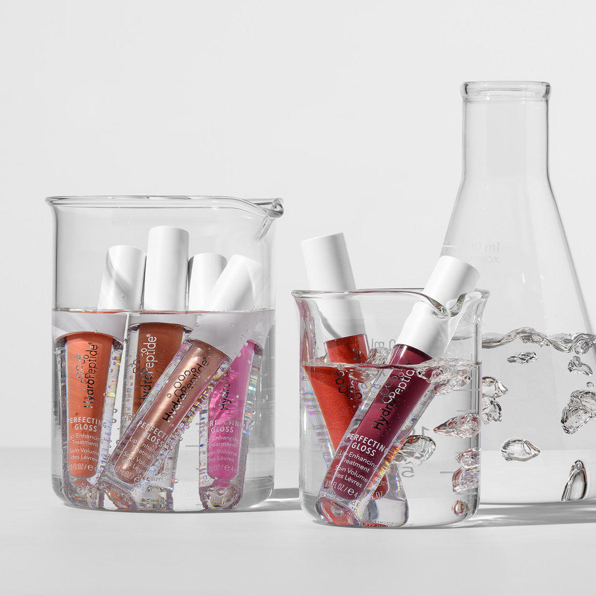 PERFECTING GLOSS - SANTORINI
Подхранващ уплътняващ тинт за устни за обем
хидратация и сияен блясък
HydroPeptide